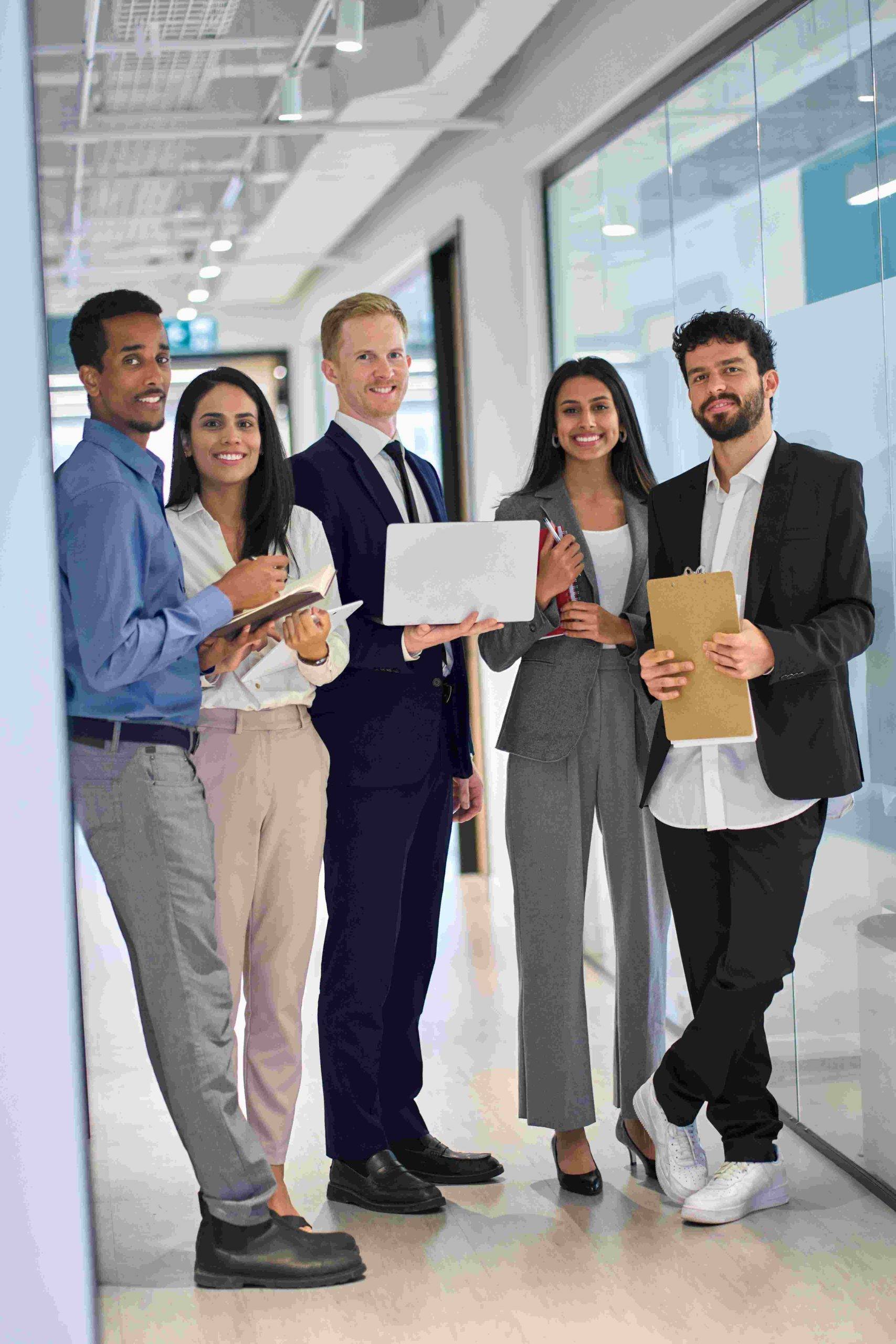 Professional diverse team collaborating on sustainability work